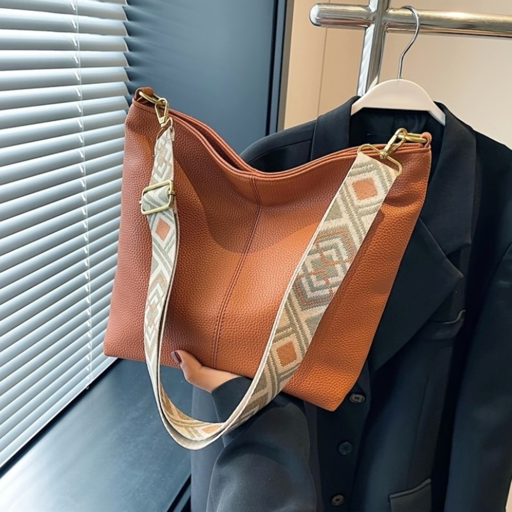 Stylish Tan Shoulder Bag with Patterned Strap
